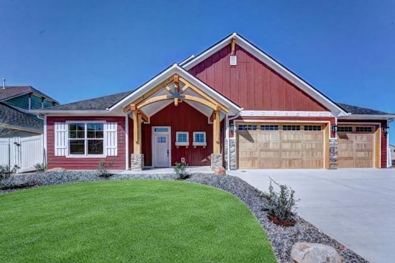 2 story home front elevation with wood beam work